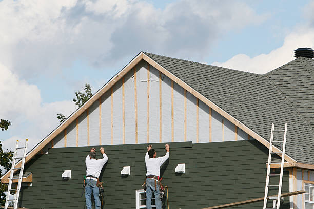Professional Emergency Siding Repair technician working in Millersburg, OH